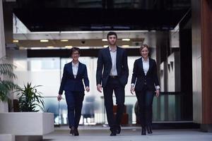 business people team walking photo