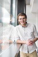 young businessman in startup office by the window photo