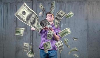 businessman making the rain of money photo