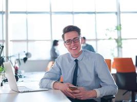 businessman working using a laptop in startup office photo