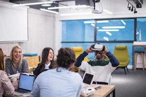 Young Multiethnic Business team using virtual reality headset photo
