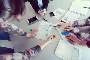 top  view of business people group brainstorming on meeting photo