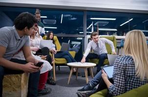 Multiethnic startup business team having meeting photo