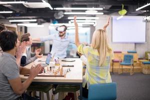 Young Multiethnic Business team using virtual reality headset photo