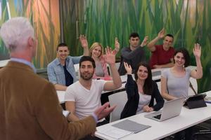 students group raise hands up photo