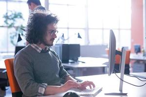 businessman working using a computer in startup office photo