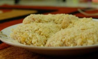 Chicken coated with breadcrumbs is ready to be fried,. photo