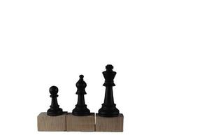 Chess pieces' from wooden cubes show the concepts of equality. Business concept photo