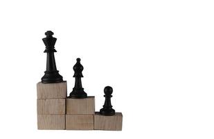 Chess pieces' from wooden cubes show the concepts of reality. Business concept photo
