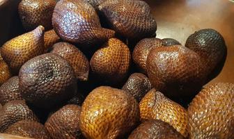 group of snake fruit or called salak in local indonesian language, or scientific name is Salacca zalacca photo