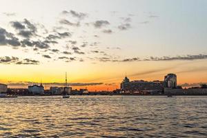 Urban landscape. Sunset on the river embankment photo