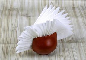 Napkins on wooden background photo