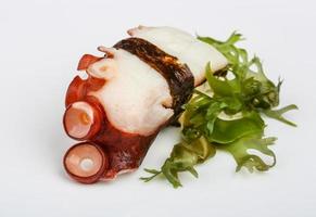 Octopus sushi on white background photo