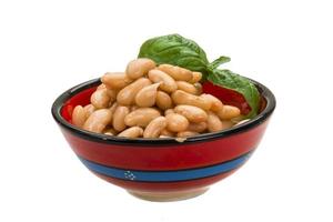 Tinned bean in a bowl on white background photo