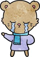 crying cartoon bear wearing winter clothes vector