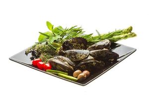 Wild mussel on the plate and white background photo