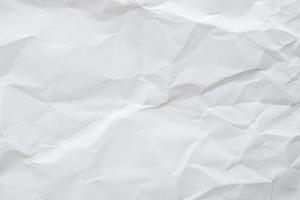 Abstract white crumpled paper texture background photo