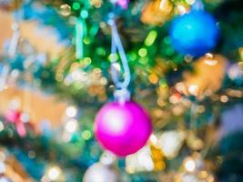 Christmas tree with bokeh light blur background photo