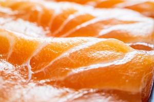 fresh salmon slice sashimi texture background photo