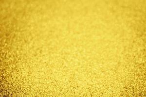 Abstract gold glitter sparkle background photo