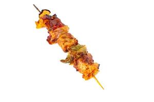 Grilled pork skewer and vegetables barbecue isolated on white background photo