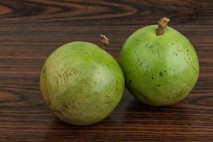 Sapote on wooden background photo