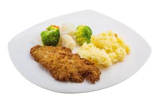 schnitzel on the plate and white background photo