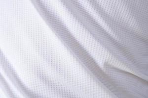 White sports clothing fabric football shirt jersey texture abstract background photo