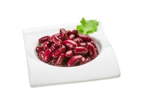 Marinated bean in a bowl on white background photo