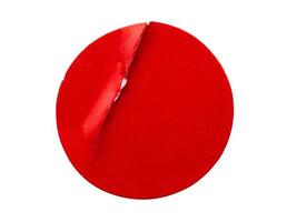 Blank red round adhesive paper sticker label isolated on white background photo