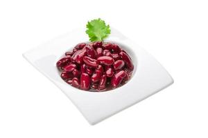 Marinated bean in a bowl on white background photo