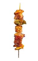 Grilled pork skewer and vegetables barbecue isolated on white background photo