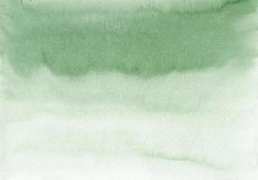 textura de fondo verde pastel ombre acuarela, pintada a mano. fondo de color verde botella de luz degradada aquarelle, manchas en papel. papel tapiz de pintura artística. foto