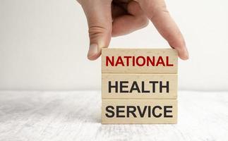 Text NHS National Health Service on a white background. photo