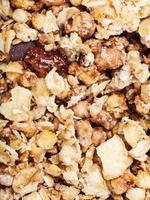 muesli with dried fruit, nuts, chocolate close up photo