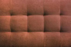 Brown suede leather background, classic checkered pattern for furniture, wall, headboard photo