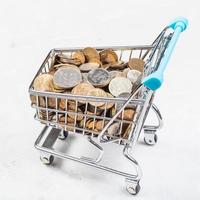 cart with russian coins on concrete plate photo