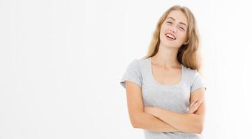 Young blonde woman with fit slim body in blank template t shirt and jeans isolated on white background. Skin and hair care. Copy space and mock up photo