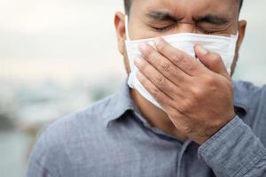 man wearing mask prevent germs photo