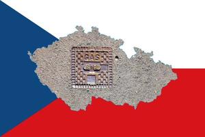 Outline map of Czech Republic with the image of the national flag. Manhole cover of the gas pipeline system inside the map. Collage. Energy crisis. photo