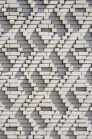 A pattern made of white bricks in the form of diamond shapes. Decoration of the walls during the Soviet Union photo