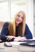 business woman working on computer at office photo