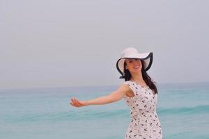 Happy Beautiful Woman Enjoying Summer Vacation photo