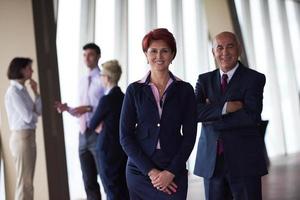 diverse business people group with redhair  woman in front photo