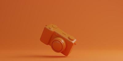Orange digital camera on orange background, technology concept. 3d rendering photo