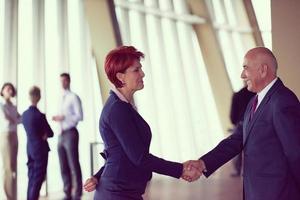 handshake of business woman and man photo