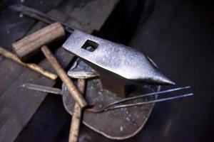 Working tool at blacksmith traditional workshop photo