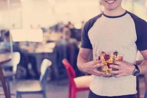 software developer eating a fruit salad photo