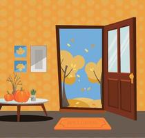 Open door into autumn view with yellow trees. Autumn interior with a coffee table, vases, pumpkins, door mat, orange wallpaper. Sunny good weather outside. Flat cartoon style vector illustration.