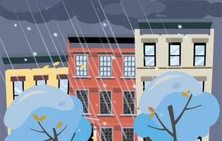 Flat cartoon vector illustration of winter snowy city street. Dark clouds over the roofs of houses, it is snowng. Street of town with bright colorful houses. Winter twilight in the city background